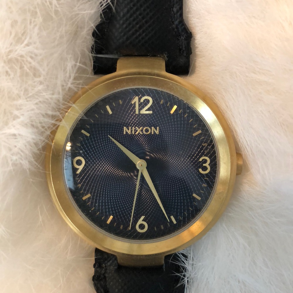 Nixon the chameleon cold blooded gold and navy